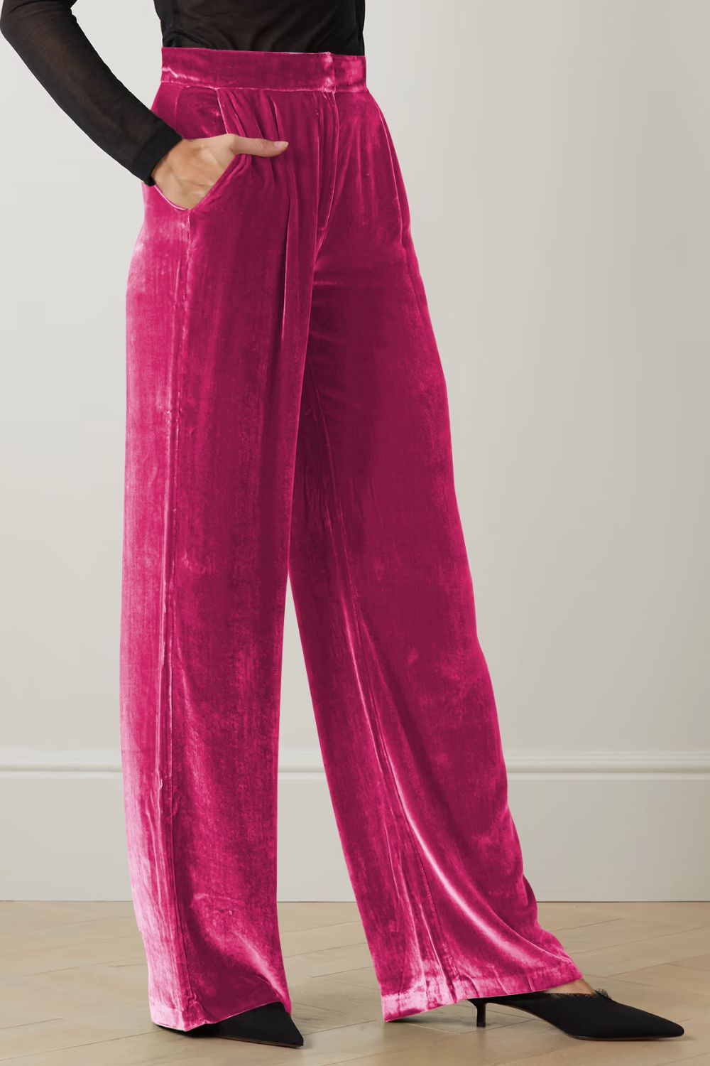 Hot pink velvet palazzo trousers with high waist and side pockets.
