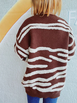 Brown textured stripe knit crewneck sweater with a relaxed fit.