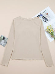 Beige ribbed long-sleeve top with lace neckline detail