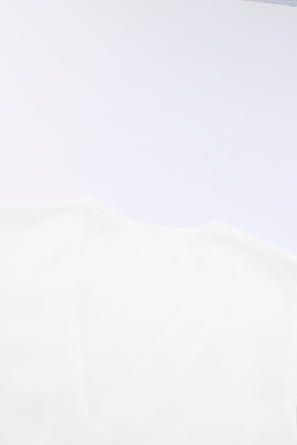 White button-down tie-front blouse with ruffle sleeves.