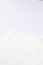 White button-down tie-front blouse with ruffle sleeves.