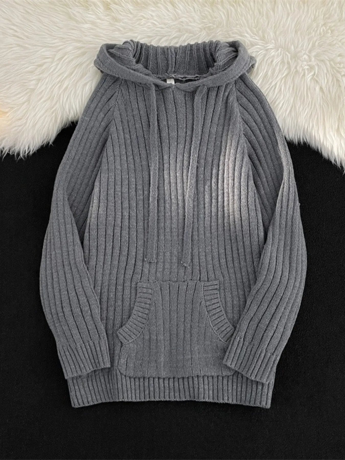 Gray ribbed knit hooded sweater with drawstring and front pocket.