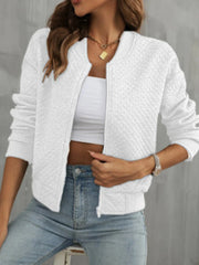 White diamond quilted bomber jacket with a zip front and crew neck.