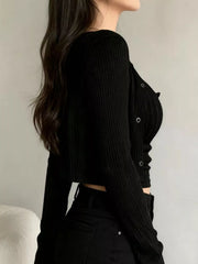 Black ribbed knit cardigan with button detail and matching tank top.