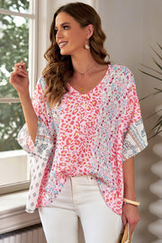 Panel print kimono sleeve blouse in floral with leopard and paisley patterns.