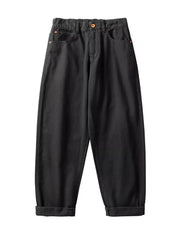 Plus-size black cotton wide-leg trousers with cuffed hems and elastic waistband.