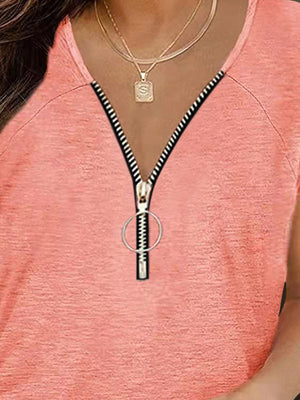 Zip-front ruched tee in Burnt Coral with cap sleeves and a ring zipper pull.