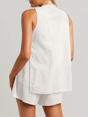 White linen co-ord set with sleeveless top and shorts, showing back detail.