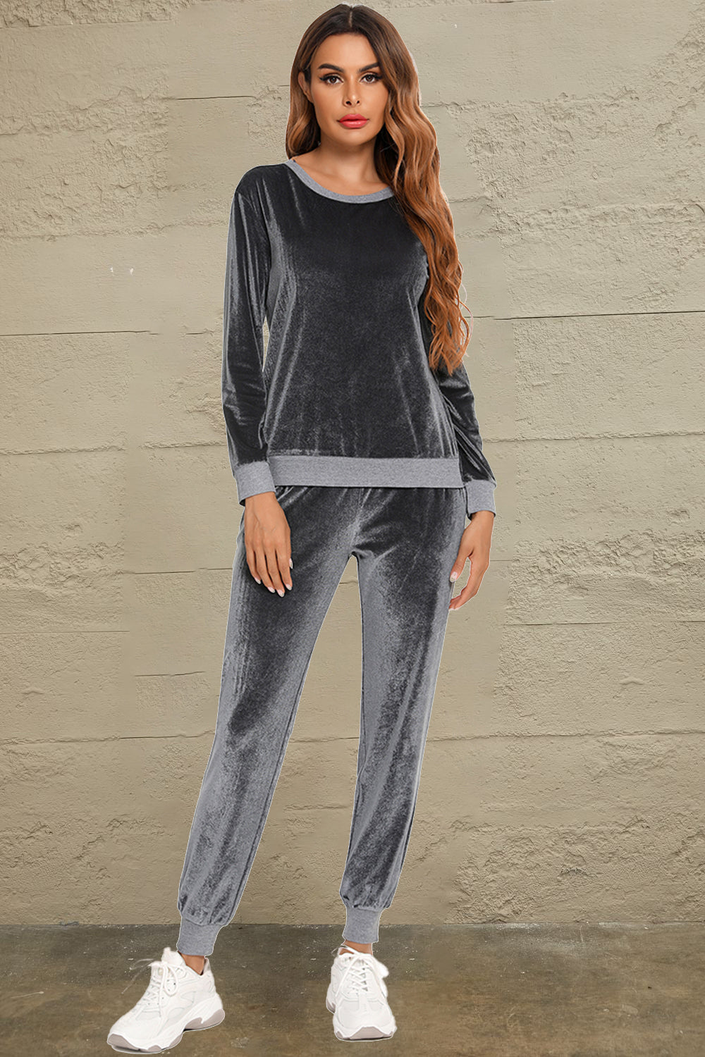 Velvet lounge set in charcoal with contrast trim crewneck top and jogger pants.