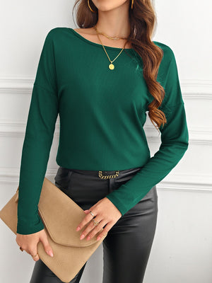 Dark green ribbed knit long sleeve top with a boat neckline.
