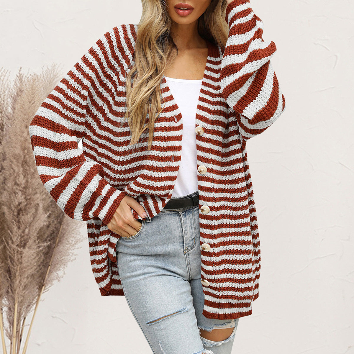 Wide stripe button-up knit cardigan in chestnut and white acrylic with button details.