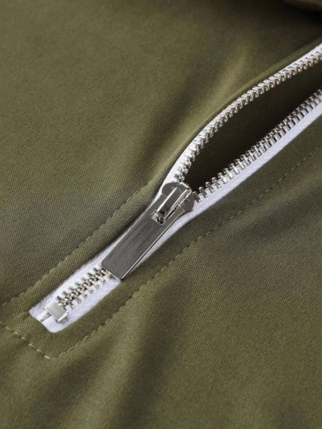 Moss zip-front polo with silver zipper detail