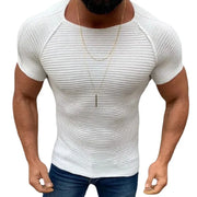 Ivory ribbed raglan tee with short sleeves and a sculptural fit.