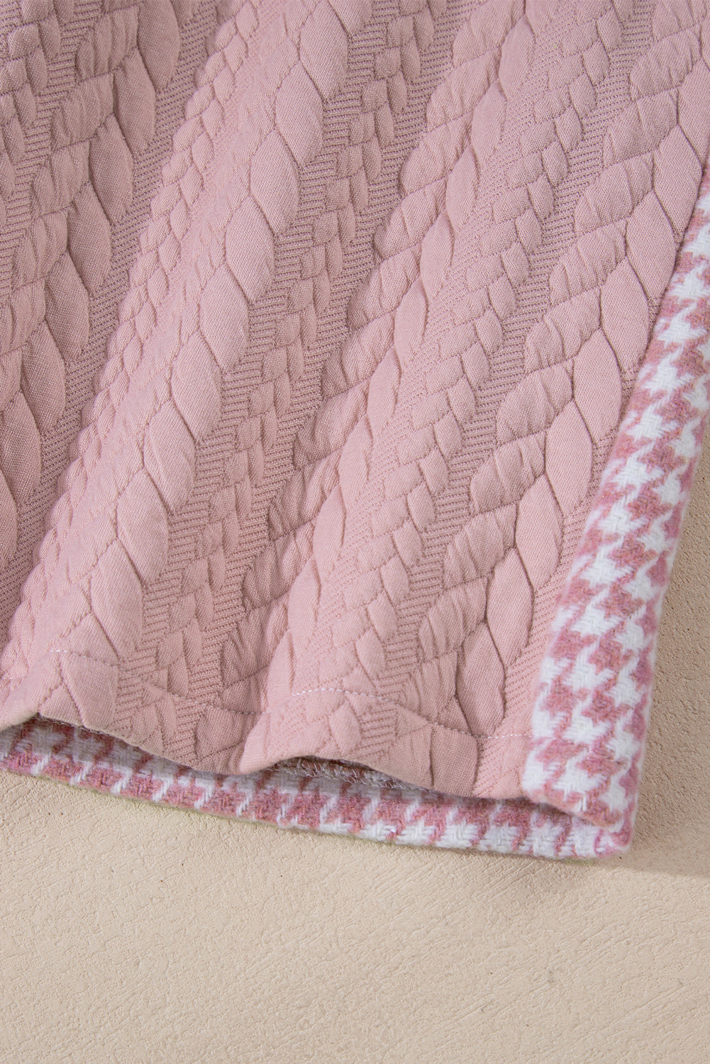 Dusty pink quilted shacket with houndstooth trim detail