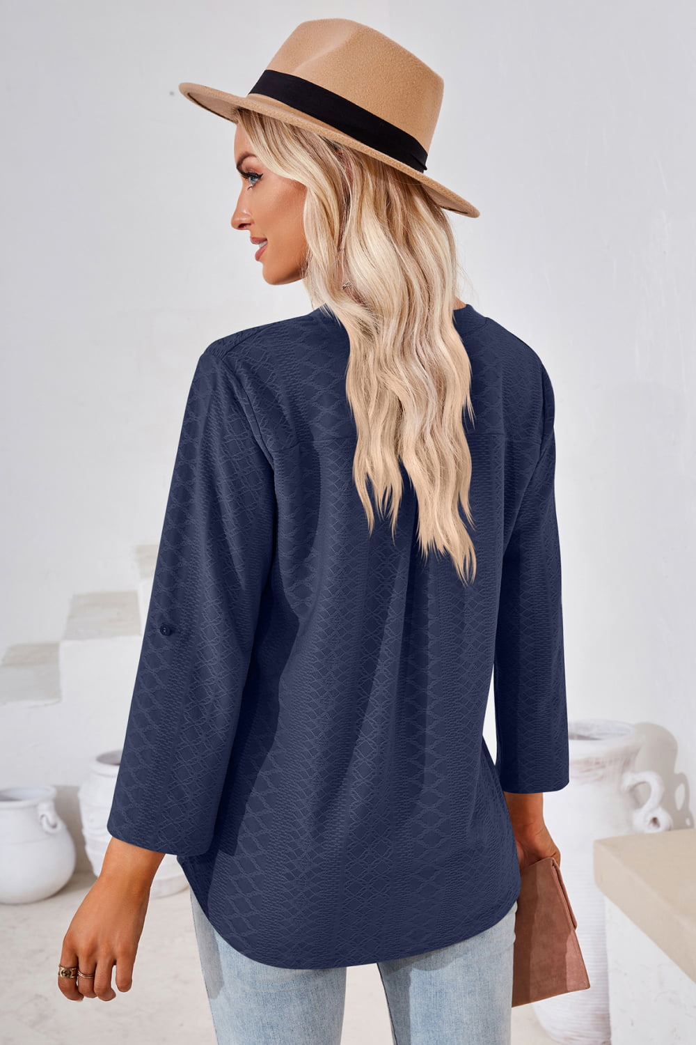 Dark Blue textured henley blouse with rolled sleeves and a relaxed fit.