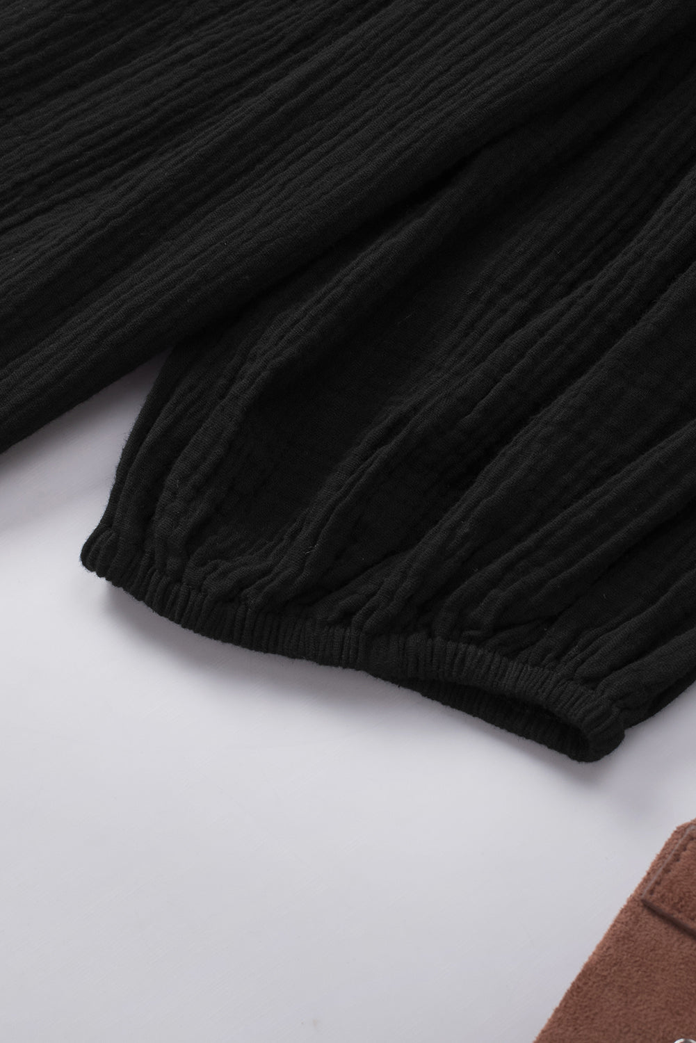 Black textured gauze blouse with gathered elastic sleeve detail
