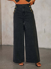 Dark wash denim wide-leg jeans with nautical button detail on the front.