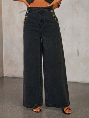 Dark wash denim wide-leg jeans with nautical button detail on the front.