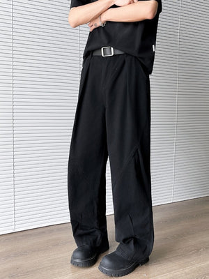 Men's black wide leg sweatpants with belt loops and pockets.