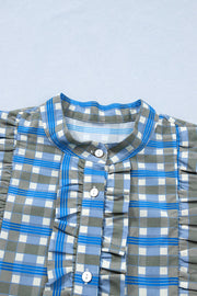 Blue plaid button-down blouse with ruffled neckline and button detail