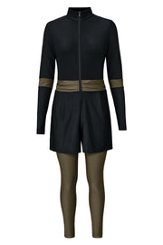 Black sporty one-piece swimsuit with zip detail, shorts, and long sleeves.