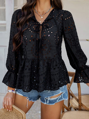 Black eyelet embroidered peplum blouse with tie neck and ruffled sleeves