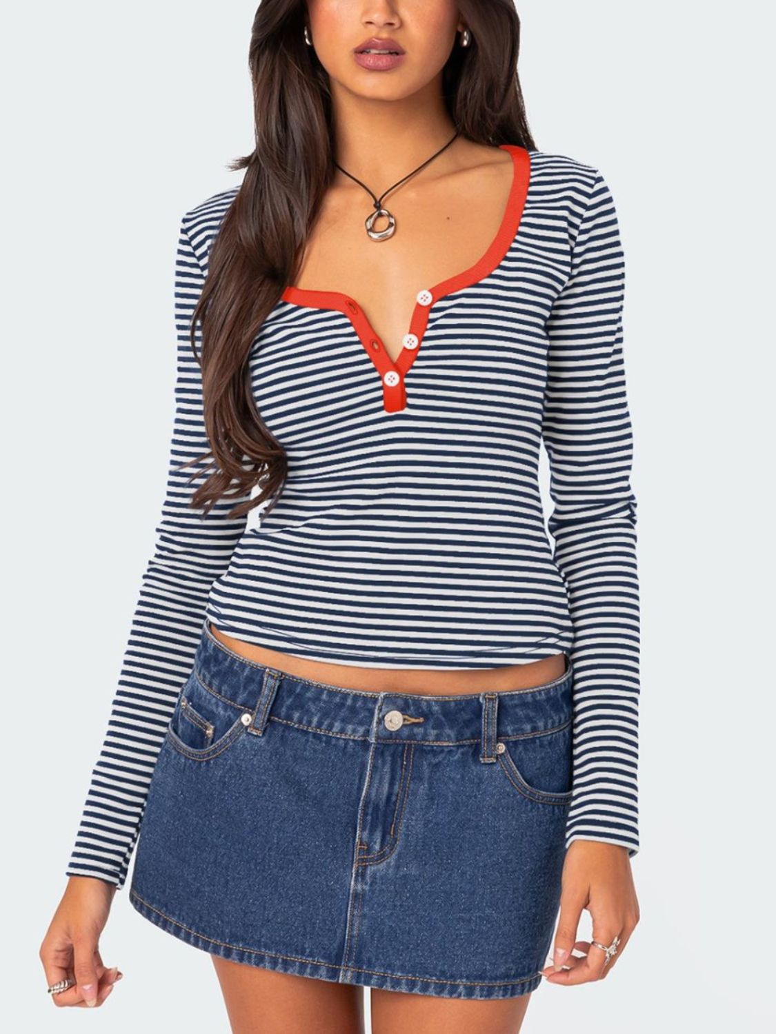 Striped Henley with contrast collar and buttons, navy and white stripes, long sleeves.