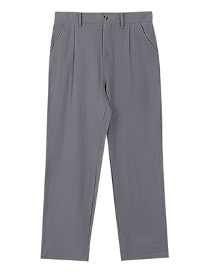 Men's grey relaxed fit sweatpants with pleats and button closure