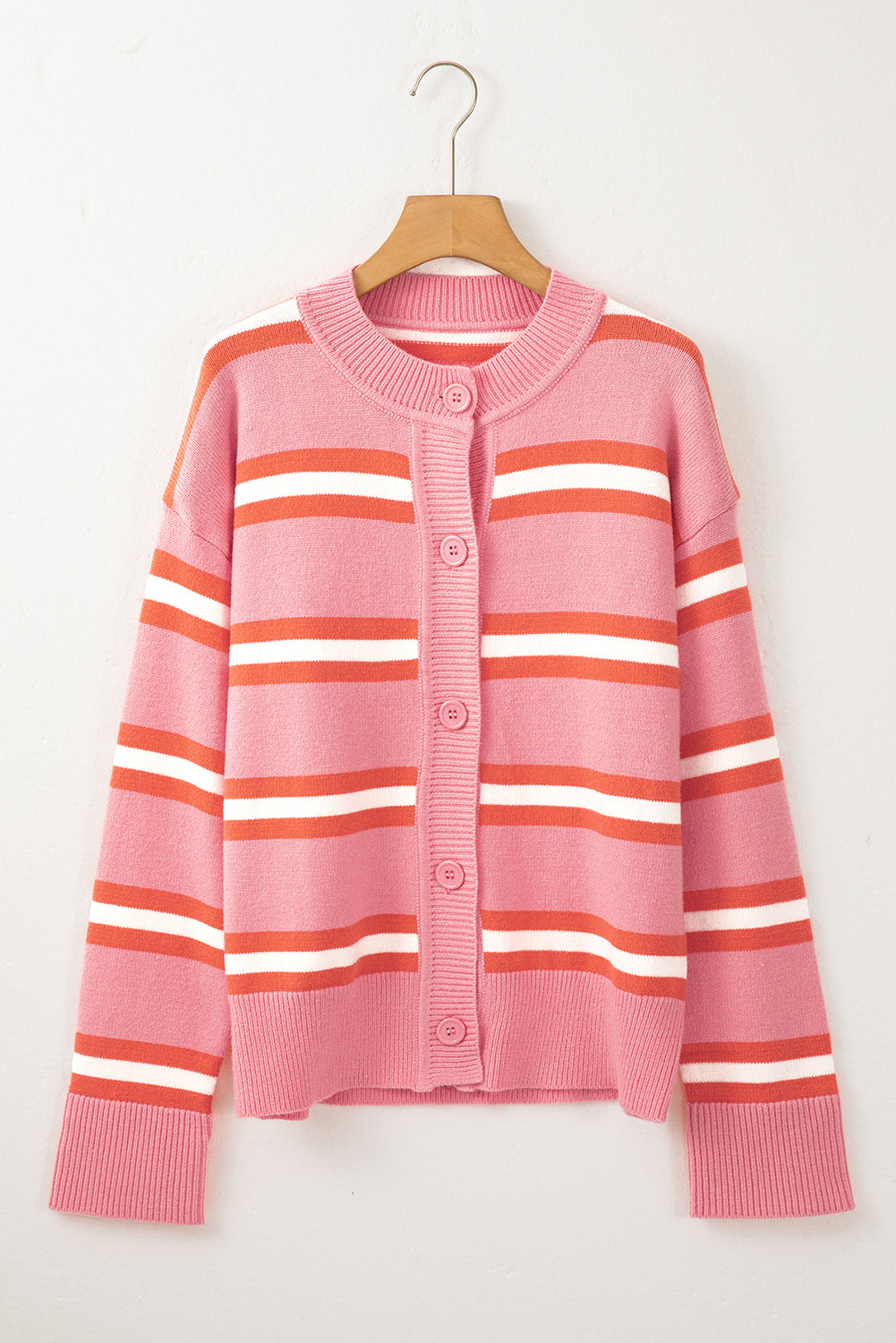 Pink striped knit cardigan with button front and crew neck.