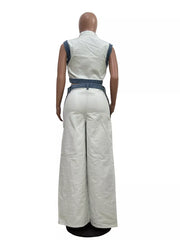 White zip-front crop top and wide-leg pants set with denim trim.