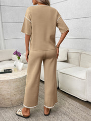 Khaki loungewear set with crew neck top and wide leg pants, featuring white piping trim.