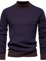 Ribbed stripe mock neck pullover sweater in navy with brown accents and vertical stripes.