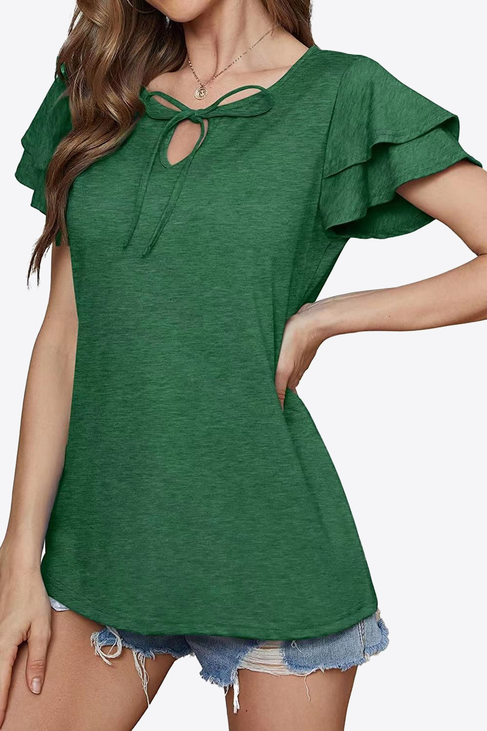 Forest green blouse with tiered flutter sleeves and a tie-neck keyhole detail.