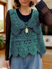 Turquoise lace overlay cropped vest with intricate floral pattern and scalloped hem.