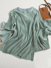 Elegant pleated two-piece set in Olive, featuring a relaxed fit and flowing sleeves.