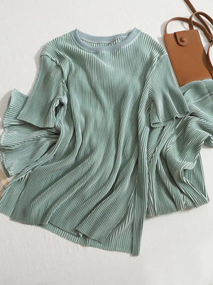 Elegant pleated two-piece set in Olive, featuring a relaxed fit and flowing sleeves.