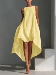 Yellow sleeveless high-low hem dress with a round neckline and asymmetrical hem.