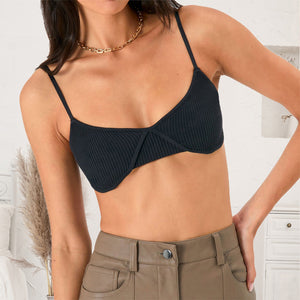 Black ribbed knit bustier bra with delicate spaghetti straps and seamed cups.