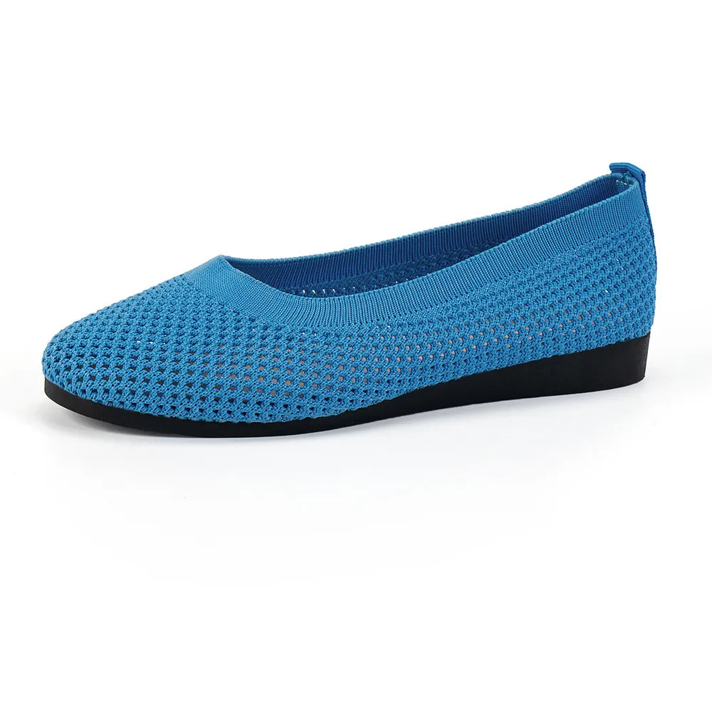 Breathable knit ballet flats in Sky Blue with a textured mesh design and black sole.