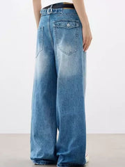 Relaxed fit vintage wash blue cotton jeans with pockets and a faded hem.