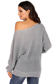 Light gray off-shoulder batwing knit sweater with loose sleeves and ribbed hem.
