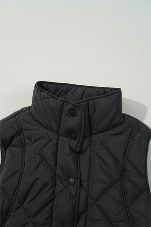 Black quilted vest with stand collar and snap closure