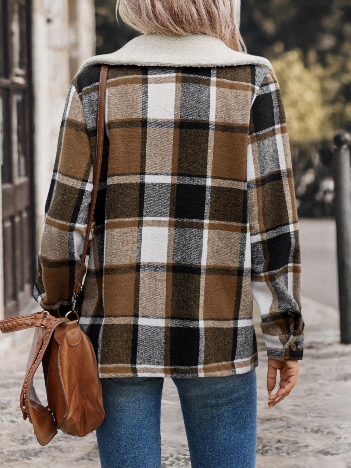 Sherpa-trimmed plaid shacket in camel with patch pockets and buttoned cuffs.