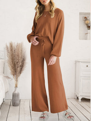 Caramel acrylic wide-leg loungewear set with drawstring waist and balloon sleeves.