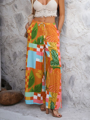 Geometric print wide-leg trousers with drawstring waist in multicolor.