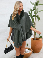 Gray faux fur collar wrap poncho with tie detail and pom-pom trim.