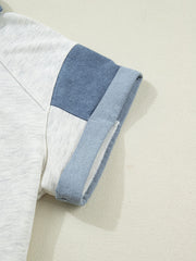 Casual cotton top with denim look sleeves and rolled cuffs.