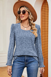 Light blue ribbed square neck tee with puff sleeves and ruffled cuffs.