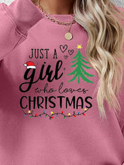 Blush Pink sweatshirt with "Just a girl who loves Christmas" graphic and string lights.