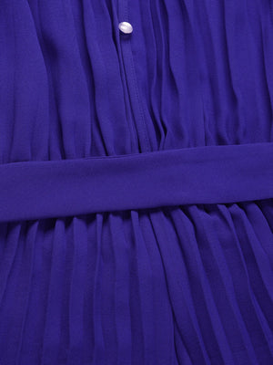 Halter neckline pleated palazzo jumpsuit in dark blue with a belted waist and button detail.
